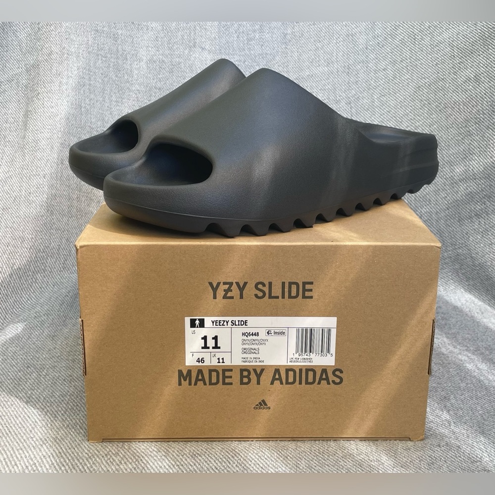 Yeezy slides, Adidas, Onyx black, men’s size 11, authentic, brand new.